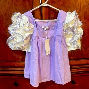 Gee Gee purple and white shirt!